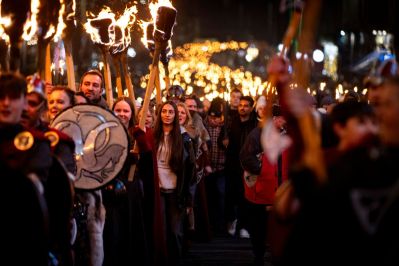 316970-edinburgh-hogmanays-torchlight-procession-medium.jpg