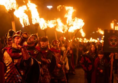 316967-edinburgh-hogmanays-torchlight-procession-medium.jpg