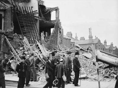 Winston_Churchill_survey_bomb_damage_in_Londons_East_End_in_1941..jpg